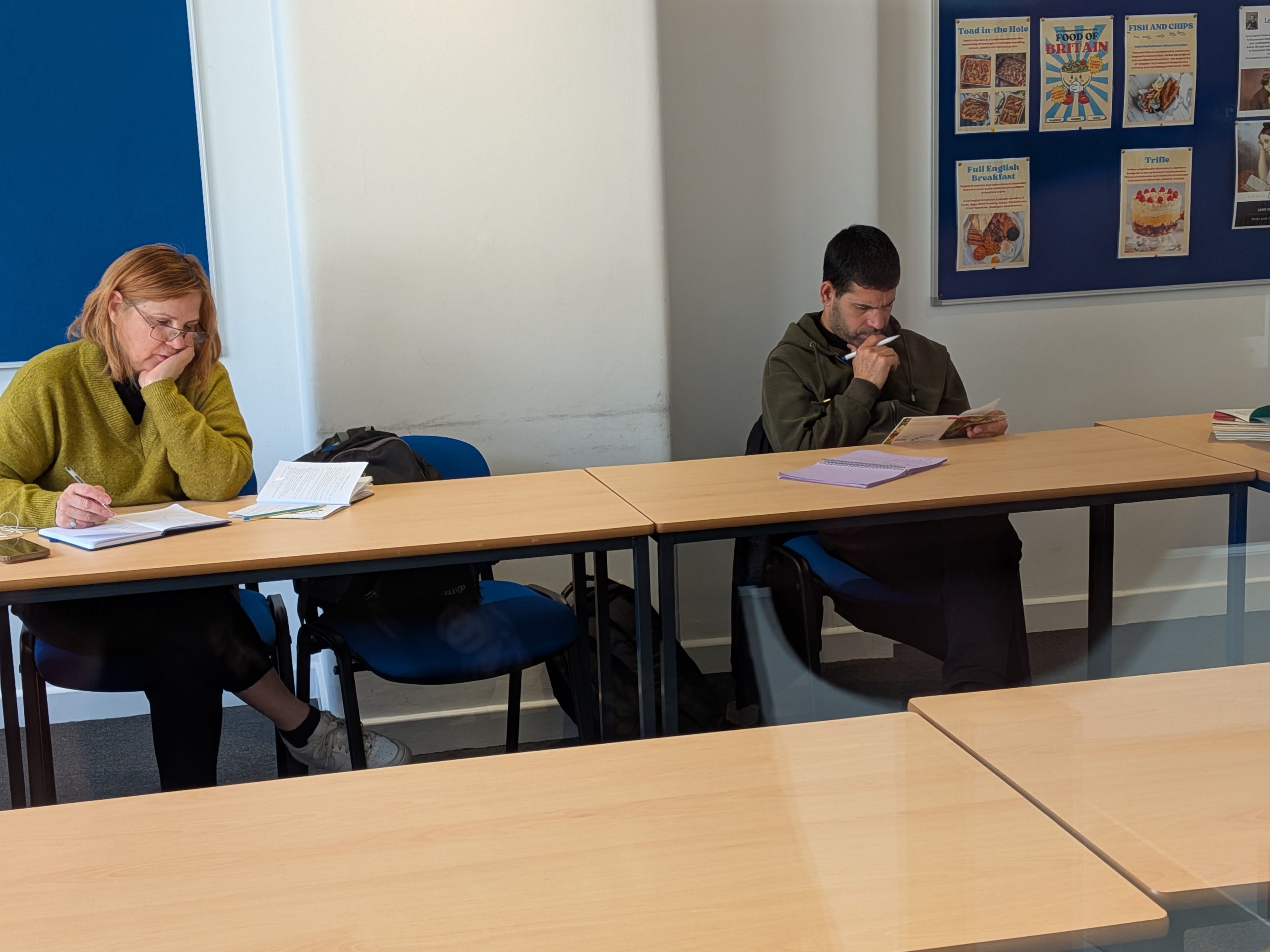 Students practising their reading in class.